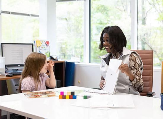 Teacher and student in 澳门新普京注册's Early Learning Center